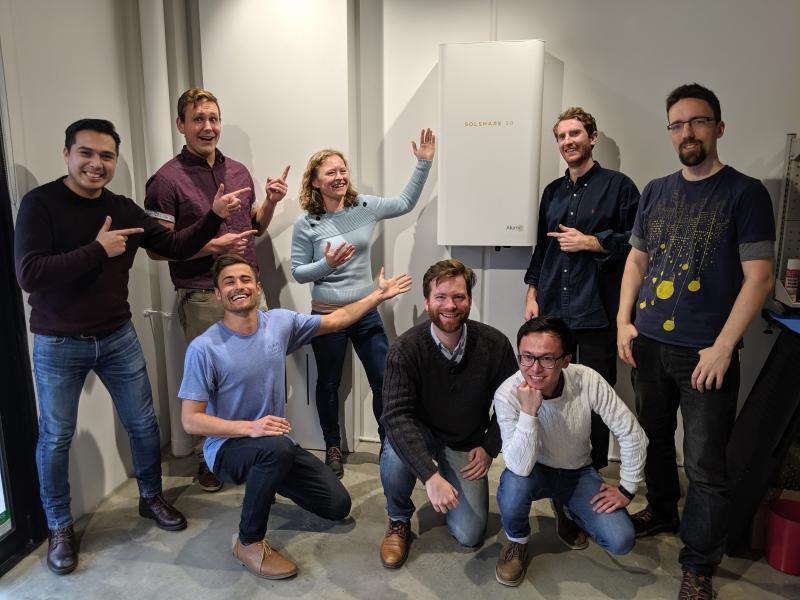 Allume team next to the SolShare